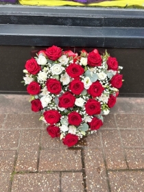 Red roses and white solid heart